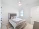 Cozy bedroom with a double bed and plenty of natural light at 8459 Harvey Walden Dr, Plant City, FL 33565