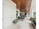 Covered patio with dining furniture and a ceiling fan at 8459 Harvey Walden Dr, Plant City, FL 33565