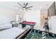 Game room with pool table, foosball table and elliptical trainer at 8459 Harvey Walden Dr, Plant City, FL 33565