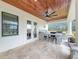 Outdoor kitchen with stone countertops and a built-in grill at 8459 Harvey Walden Dr, Plant City, FL 33565