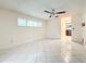 Spacious bedroom with tile flooring and ceiling fan at 9391 121St Ter, Largo, FL 33773