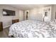 Main bedroom with en-suite bathroom access at 9825 Lakeside Ln, Port Richey, FL 34668