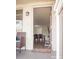 Open door view into the living and dining area at 9825 Lakeside Ln, Port Richey, FL 34668