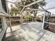 Large screened patio and wooden deck great for outdoor enjoyment at 9825 Lakeside Ln, Port Richey, FL 34668
