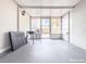 Screened porch with concrete floor and exterior access at 9825 Lakeside Ln, Port Richey, FL 34668