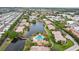 Community features lake, pool, and lush landscaping at 10263 Gandy N Blvd # 2206, St Petersburg, FL 33702