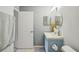 Bathroom with light blue vanity and shower/tub combo at 10263 Gandy N Blvd # 2206, St Petersburg, FL 33702