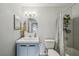 Bathroom with light blue vanity and shower/tub combo at 10263 Gandy N Blvd # 2206, St Petersburg, FL 33702