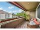 Relaxing screened balcony with patio furniture and a view at 10263 Gandy N Blvd # 2206, St Petersburg, FL 33702