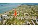 Property location shown from above in relation to the water at 1034 Sunnydale Dr, Clearwater, FL 33755