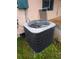 Exterior air conditioning unit in the backyard at 1106 Carlton St, Clearwater, FL 33755