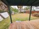 View from deck, showing a mostly grassy backyard at 1106 Carlton St, Clearwater, FL 33755