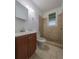 Small bathroom with shower, toilet, and vanity at 1106 Carlton St, Clearwater, FL 33755