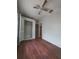 Bedroom with wood floors and a spacious closet at 1106 Carlton St, Clearwater, FL 33755