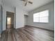 Spacious bedroom featuring wood flooring and ample closet space at 1106 Carlton St, Clearwater, FL 33755