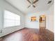 Living room with wood floors and kitchen pass-through at 1106 Carlton St, Clearwater, FL 33755