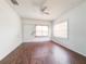 Living room with wood floors and large windows at 1106 Carlton St, Clearwater, FL 33755