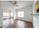 Living room with wood floors and a view to kitchen at 1106 Carlton St, Clearwater, FL 33755