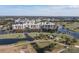 High angle view displays the condo community with a beautiful golf course and waterways at 1200 Country Club Dr # 6206, Largo, FL 33771