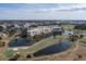 Condos with water and golf course views; city skyline in background at 1200 Country Club Dr # 6206, Largo, FL 33771