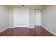 Spacious bedroom with hardwood floors and ample closet space at 1200 Country Club Dr # 6206, Largo, FL 33771