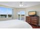 Main bedroom with hardwood floors and golf course view at 1200 Country Club Dr # 6206, Largo, FL 33771