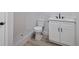 Clean bathroom with white vanity and tile shower at 12413 Gunstock Ln, Hudson, FL 34667