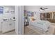 Charming bedroom with a queen bed, walk-in closet and private bathroom at 12413 Gunstock Ln, Hudson, FL 34667