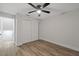 Bedroom with large closet and ceiling fan at 12413 Gunstock Ln, Hudson, FL 34667