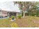 Fenced backyard with patio and landscaping at 12512 River Mill Dr, Hudson, FL 34667