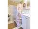 Clean bathroom with shower/tub combo, toilet, and vanity at 12512 River Mill Dr, Hudson, FL 34667