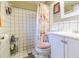 Clean bathroom with shower/tub combo, toilet, and vanity at 12512 River Mill Dr, Hudson, FL 34667