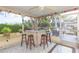 Relaxing screened porch with bar and seating at 12512 River Mill Dr, Hudson, FL 34667