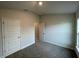 Bedroom with neutral walls, carpet, and closet at 13251 Ogden Glade Rd, Dade City, FL 33525