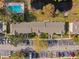 Aerial view of community with building and parking at 13630 Forest Lake Dr, Largo, FL 33771