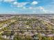 Aerial view of a community featuring townhouses and pools at 13630 Forest Lake Dr, Largo, FL 33771