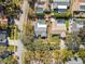 Aerial view showcasing home's private pool and desirable neighborhood location at 1695 Honeybear Ln, Dunedin, FL 34698