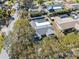 Aerial view of the property, showing the home's size and private pool at 1695 Honeybear Ln, Dunedin, FL 34698