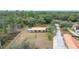 Aerial view of house and property with long driveway at 18010 Okeene Dr, Hudson, FL 34667