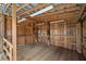 Interior view of a barn with wooden walls and flooring at 18010 Okeene Dr, Hudson, FL 34667