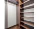 Spacious closet with shelves and hanging space at 18010 Okeene Dr, Hudson, FL 34667