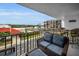 Relaxing balcony furniture with water views at 19111 Vista Bay Dr # 304, Indian Shores, FL 33785