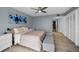 Spacious bedroom with king-size bed and ample closet space at 19111 Vista Bay Dr # 304, Indian Shores, FL 33785