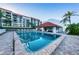 Refreshing community pool and relaxing patio area at 19111 Vista Bay Dr # 304, Indian Shores, FL 33785