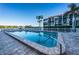 Community pool with patio and waterfront view at 19111 Vista Bay Dr # 304, Indian Shores, FL 33785