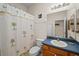 Clean bathroom with shower/tub combo, vanity and toilet at 1933 Sterling Glen Ct, Sun City Center, FL 33573