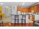 Kitchen island with seating, offering a casual dining space at 1933 Sterling Glen Ct, Sun City Center, FL 33573