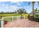 Brick patio overlooking the golf course at 1933 Sterling Glen Ct, Sun City Center, FL 33573