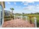 Brick patio with golf course and pond view at 1933 Sterling Glen Ct, Sun City Center, FL 33573