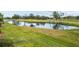 Peaceful pond view alongside the golf course at 1933 Sterling Glen Ct, Sun City Center, FL 33573